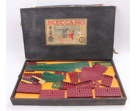 A Meccano Engineering for Boys, circa 1930, No. 5 outfit, comprising of dark red and dark green components, with a quantity o