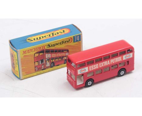Matchbox Superfast no.74, Daimler bus, red body and base, 5 spoke narrow wheels, "Esso Extra Petrol" advert to both sides, ho