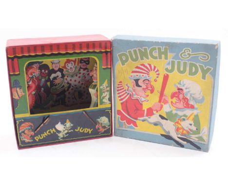Tinplate Punch and Judy theatre toy, complete with instructions in original box, good condition. Approx 20cm square.