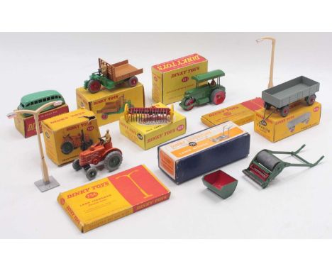Dinky Toys group of 9 diecasts and accessories to include; No. 751 Lawn Mower, No. 428 Trailer, No. 301 Field Marshal Tractor