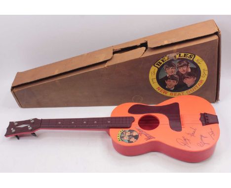 Selcol The Beatles New Beat vintage plastic guitar, with 4 strings, original card box, body strap and leaflet, nice example
