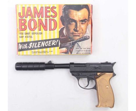 Lone Star "James Bond" 100 Shot Repeater Cap Pistol finished in black, gold, housed in the original card box with Sean Conner