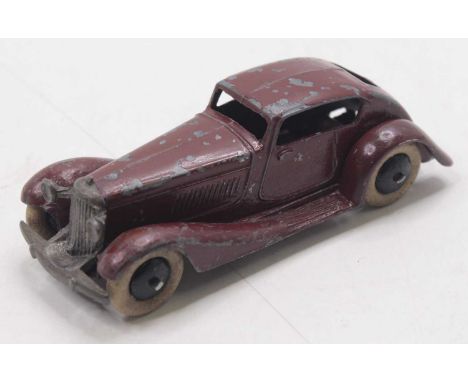 Dinky Toys Pre War, 24E, Super Streamlined Saloon, all maroon/brown example with white tyres and black hubs, type 2 criss cro