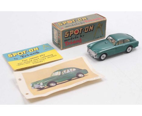 A Triang Spot-On Model No. 113 Aston Martin DB Mk3, comprising of metallic blue to green body, with cream interior and silver