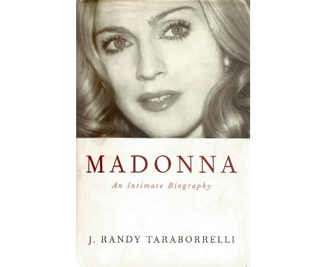 Madonna Unsigned book Titled Madonna An Intimate Biography by J Randy Taraborrelli. First Edition Hardback Book. Some Interes