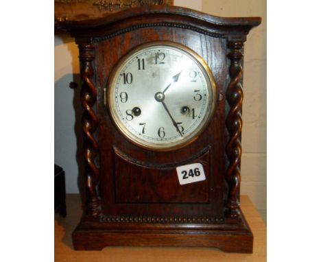 Oak mantle clock with barley twist decoration