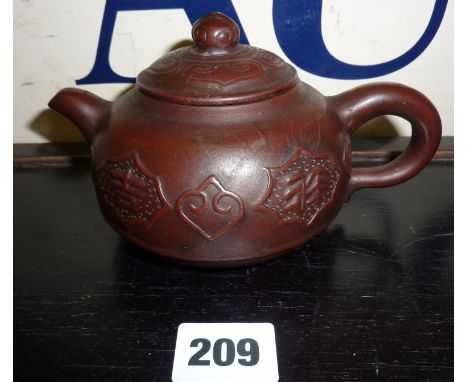 Chinese Stoneware Yixing teapot and cover with moulded decoration