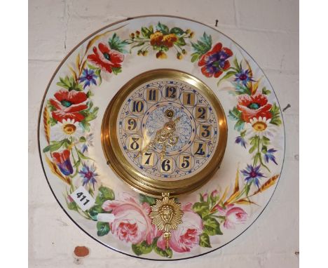 Kitsch kitchen wall clock on floral painted wall plate