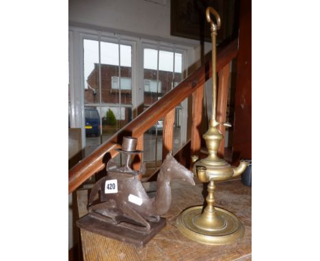 Eastern brass spirit lamp and a tin camel