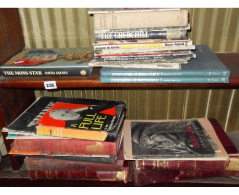 Two shelves of books relating to WW1 and WW2