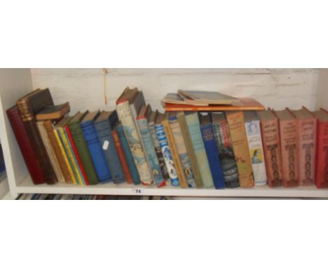 Shelf of assorted books