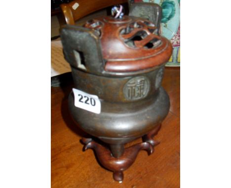 19th c. Chinese bronze "calligraphy" censer with pierced and carved hardwood lid and shaped stand