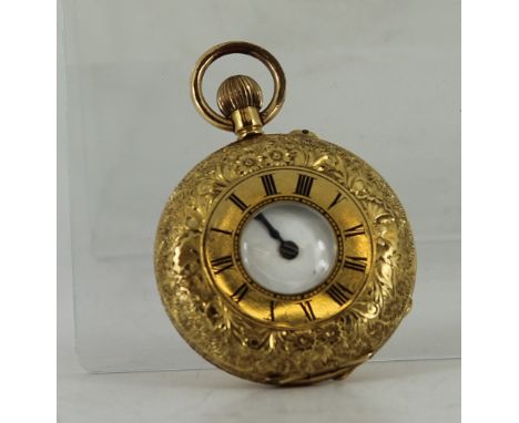 18ct gold half hunter pocket fob watch with chased decoration and enamel dial. Top wind. gross 37g  