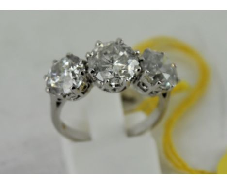 18ct white gold three stone diamond ring over 7cts size: O 