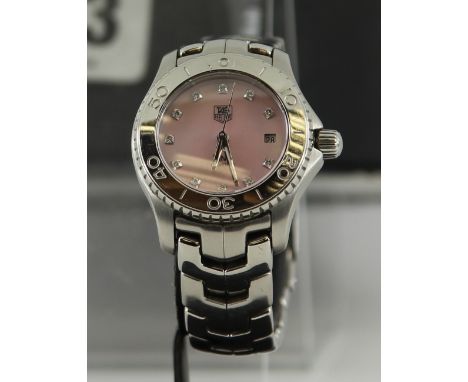 Ladies Tag Heuer mother of pearl and diamonds watch.  