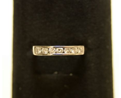 platnum half eternity  ring with 7 diamonds approx 0.07ct each 4.47g size: M 
