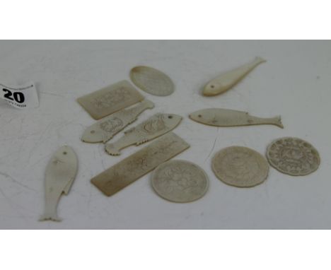 11 mother of pearl pieces including: 5 fish and other flower patterned pieces  