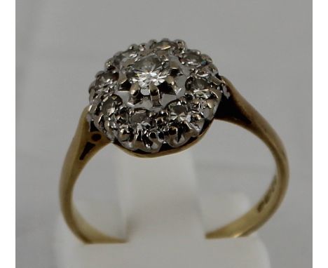 Ladies Diamond cluster ring - 8 small diamonds and 1 larger centre diamond approx 0.2ct. size L/M  