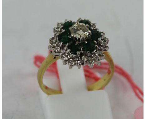 18ct yellow gold emerald and diamond cluster ring. Size: N 