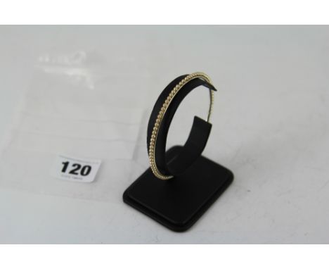 Indian style bangle with pearl like beads around the edge  