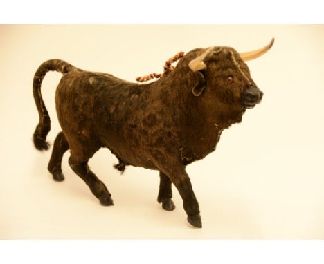 A vintage Bull or Bisson, leather nose, glass eye and real fur  