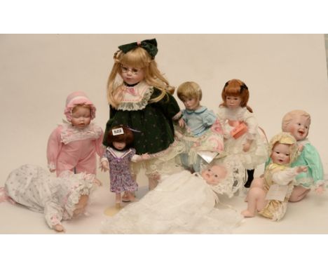 a collection of 8 porcelain dolls from princess house, Franklin mint and Knowles `jade` with stand and accessories `dolly`s t