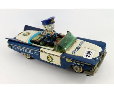 Vintage tin car - american highway patrol - battery operated - untested - condition - good for age  