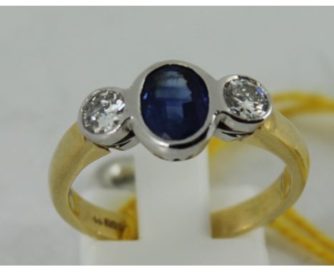 18ct yellow gold sapphire and diamond three stone ring. size: R 