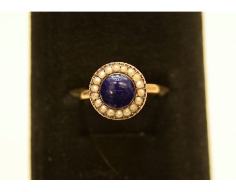 14ct gold ring with large blue stone surrounded by small pearl style stones 3.40g size:K 