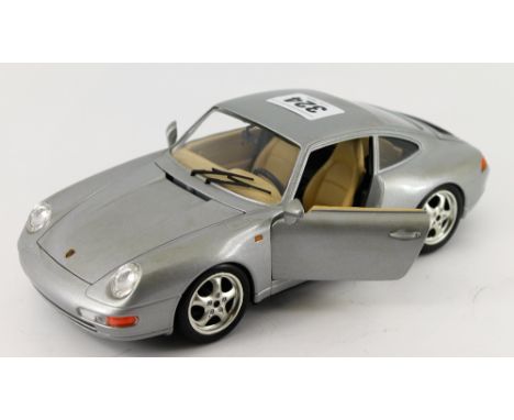 A Burago 1:18 scale Porsche 9/11  