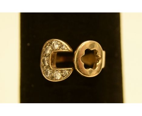 9ct gold `spanner` style ring with 7 Cubic Zirconia 9.65g size: R 