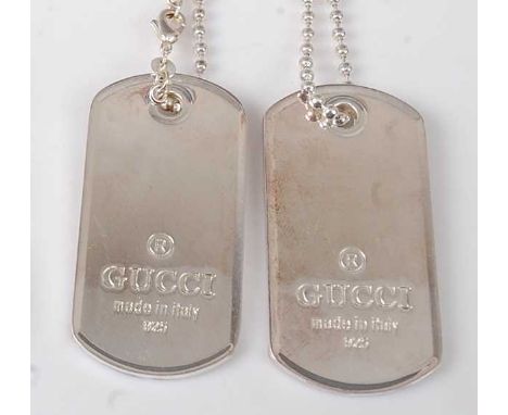 A pair of Gucci silver dog tags on single beaded chain, 44g, each 5cm
