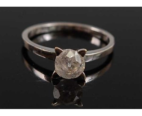 A white metal diamond solitaire ring, featuring a round faceted diamond in a four claw setting, diamond dimensions approx 4.7