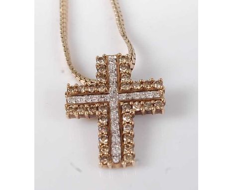 A modern 9ct gold diamond point set cross pendant, arranged as three rows of small claw set brilliants, length 25mm, on a 9ct