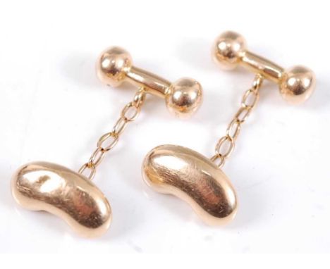 A pair of 15ct yellow gold double-ended cufflinks, each comprising a kidney bean and dumb-bell link with 25mm oval trace link