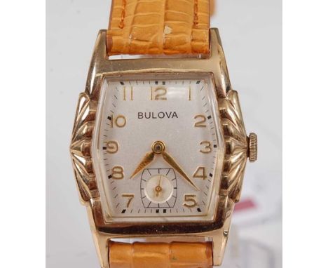 A Bulova gold plated gent's small size tank watch, having signed champagne dial with Arabic numerals, subsidiary seconds dial