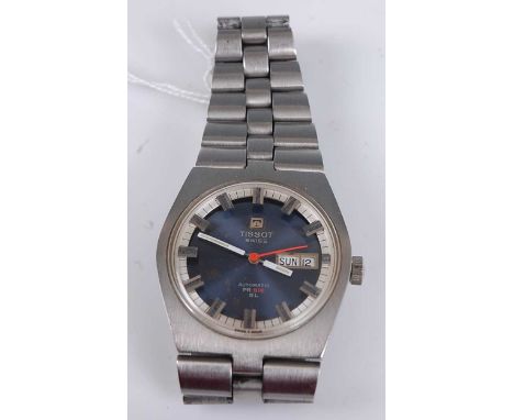 A gent's steel cased Tissot PR516GL automatic wristwatch, having signed blue day/date dial, baton markers, orange sweep secon