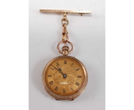 A 9ct yellow gold lady's manual wind open faced fob watch, with gilded Roman dial and engraved floral detail to the case, sus