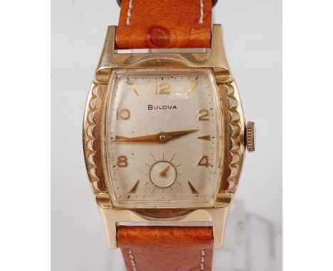 A gent's Bulova gold plated tank watch, having signed silvered dial, alternating Arabic numerals with baton markers, subsidia