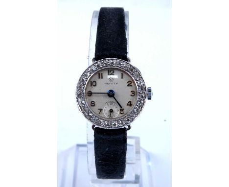 A lady's white metal manual wind Verity Incabloc diamond cocktail watch, having round cream Arabic dial and subsidiary dial a