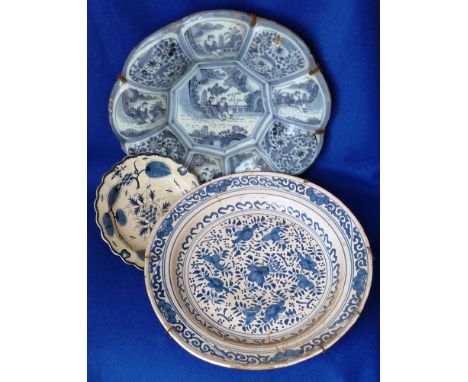 A European flower head shaped Delftware Bowl (18th/19th Century), in Kraak style, the alternating panels decorated with figur