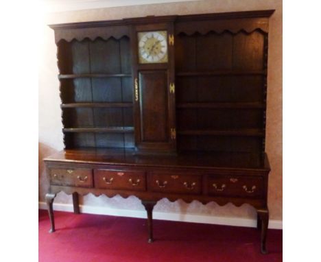 A good, rare and unusual late 18th Century oak and mahogany crossbanded Housekeeper's Dresser, the central breakfront Longcas