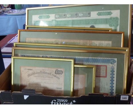 An interesting selection of alter framed and glazed mostly 19th Century Share Certificates from around the World including Ch