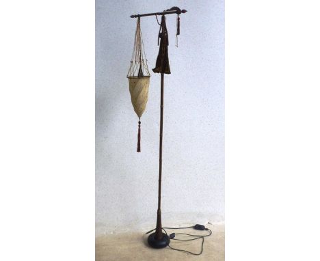 An unusual Eastern style Cesendello floor Lamp having swirling gilded Shade in Moorish style, bamboo stem and weighted base, 