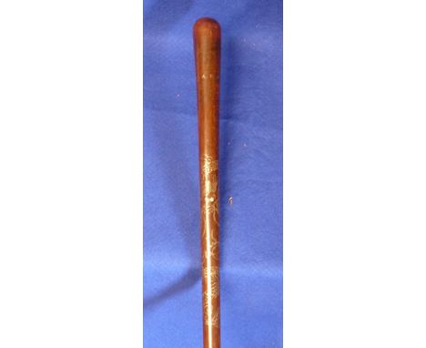 An early 20th Century Chinese hardwood Walking Stick decorated pin-nail style with a dragon and flaming pearl of wisdom among
