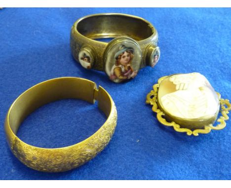 A large late 19th/early 20th Century oval Cameo carved in relief with a quarter length female profile, 'C' scroll style Pinch