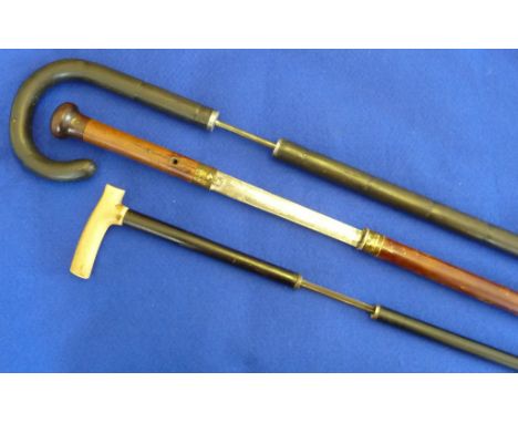 Three late 19th/early 20th Century Sword Sticks (as walking sticks), one with whistle shaped carved and patinated ivory handl