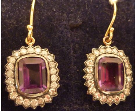 A pair of amethyst and diamond cluster Earrings (1 carat diamonds)