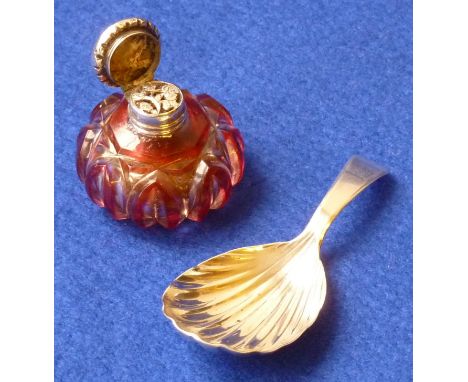 An early 19th Century hallmarked silver Caddy Spoon having shell shaped bowl, together with a small 19th Century hand cut mel