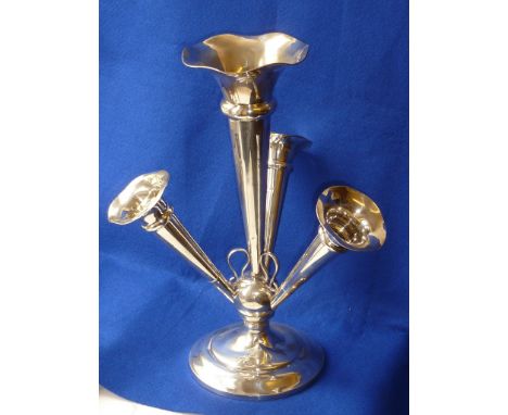 A large early 20th Century hallmarked silver Epergne central drop in shaped holder flanked by three further smaller angular e